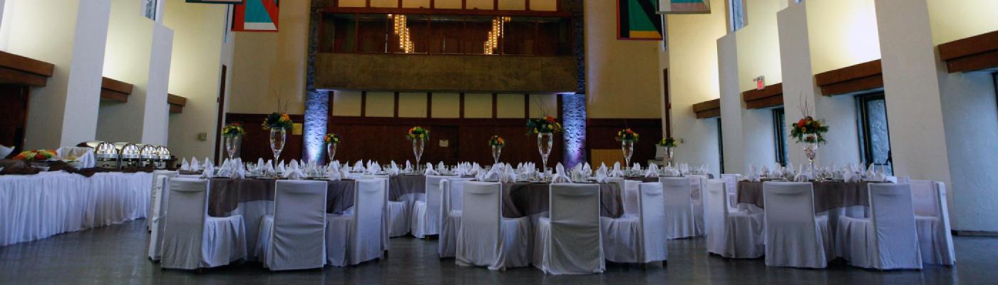 Tables set up for a wedding in the Great Hall 