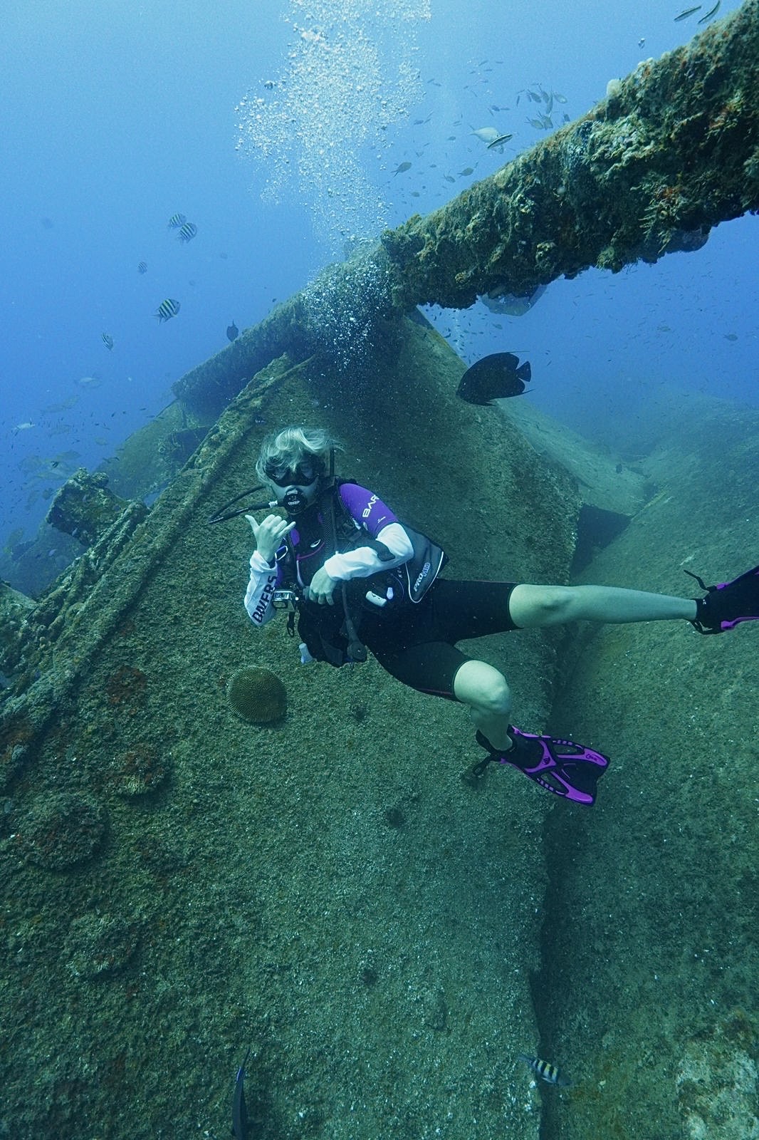 Student underwater in SCUBA gear