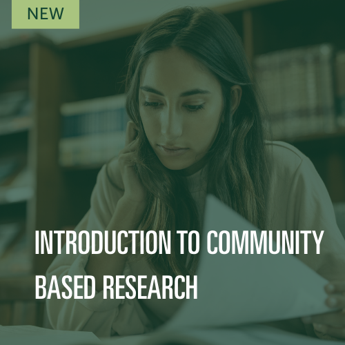 image of a person reading papers at a desk in a library. Text overlay reads: “NEW” and “Introduction to Community Based Research.”