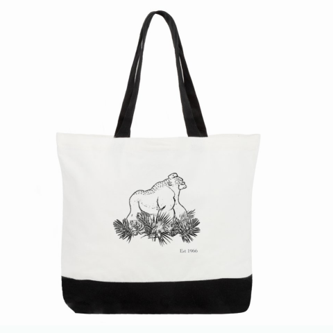 Large black and white Pax tote bag, image of pax walking around in nature.