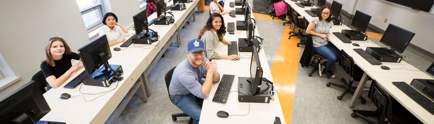 Students sitting in a computer lab