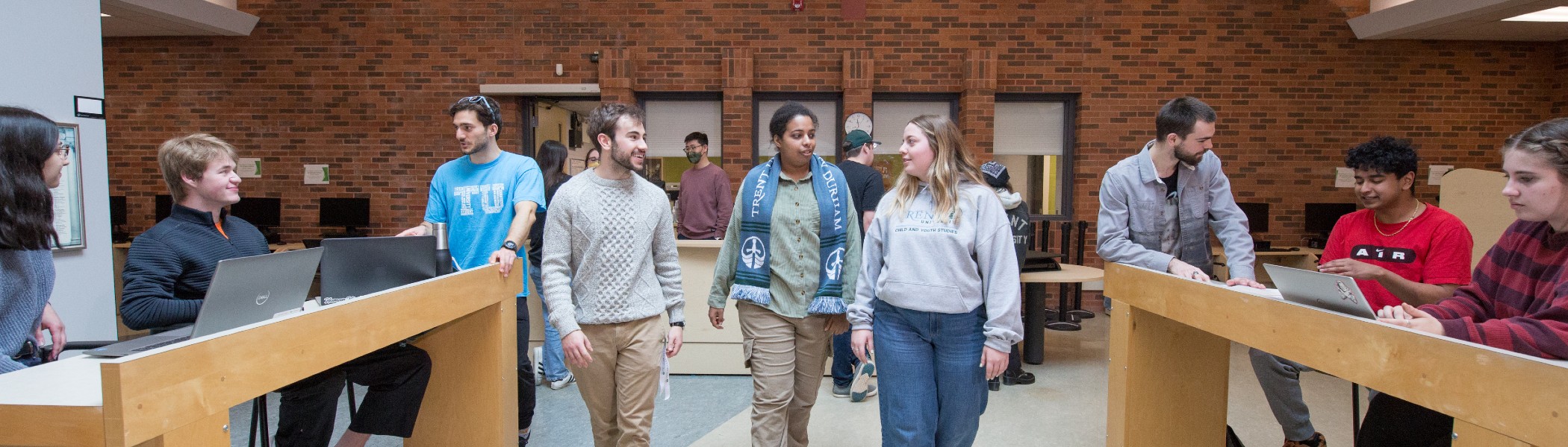 Students walking through the Trent Durham Library