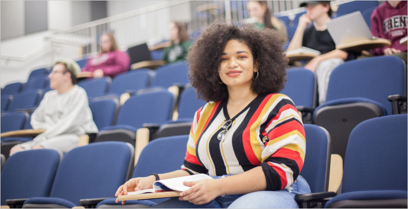 A student in Kirk Hall for a class