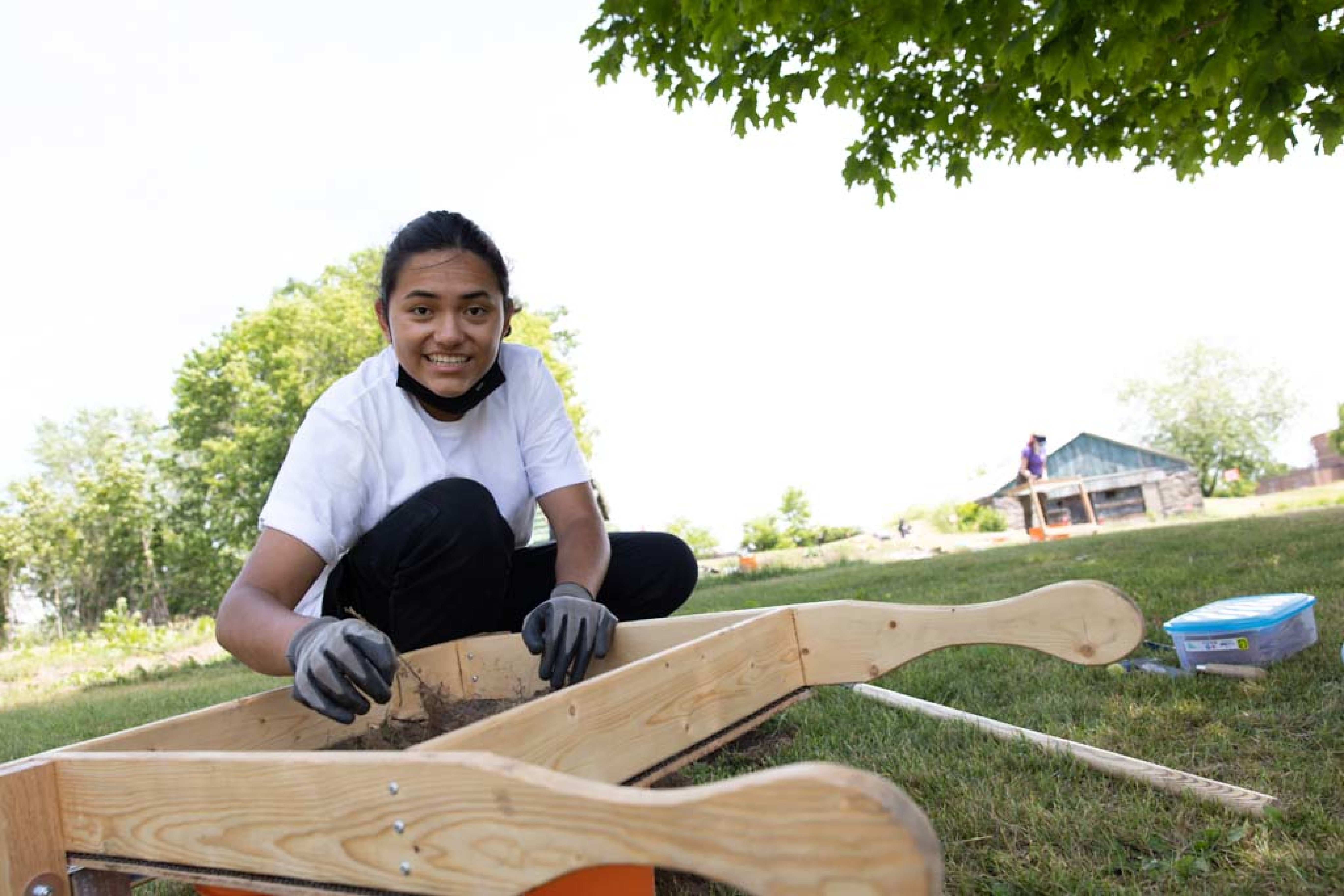 A student working in the field on a research project 