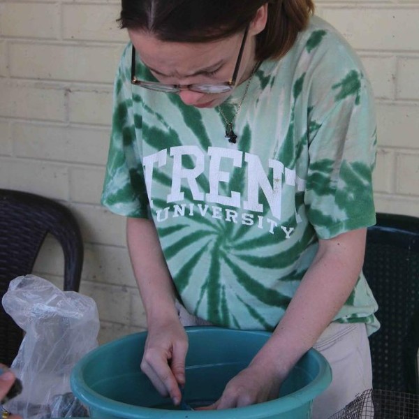 A student working on an archaeology project