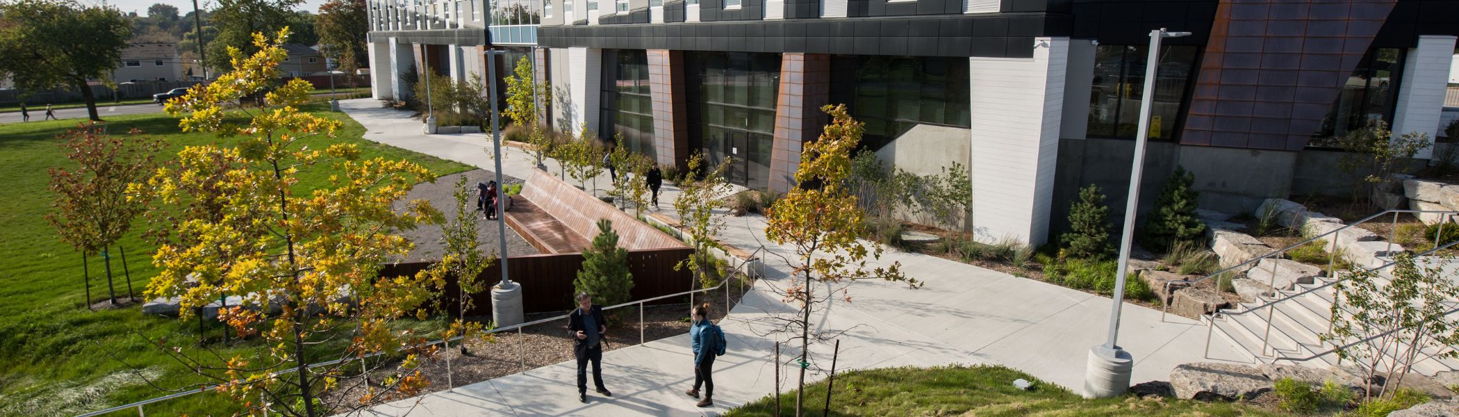 People standing and talking outside Trent Durham Building B