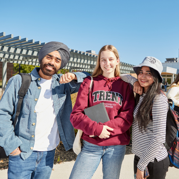 Three students posing at the Trent Durham campus