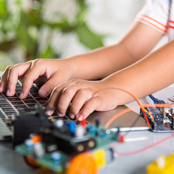 Childs hand computer with electronics around it