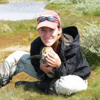 A student with a duck