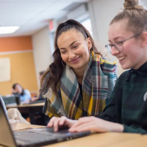 Trent University students working together in class.