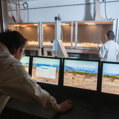 Trent University student doing climate research in lab.