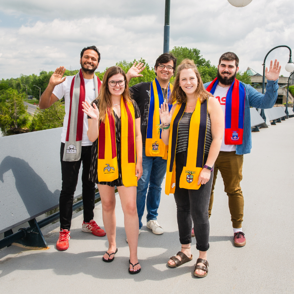 Group of Trent students with College scarfs.