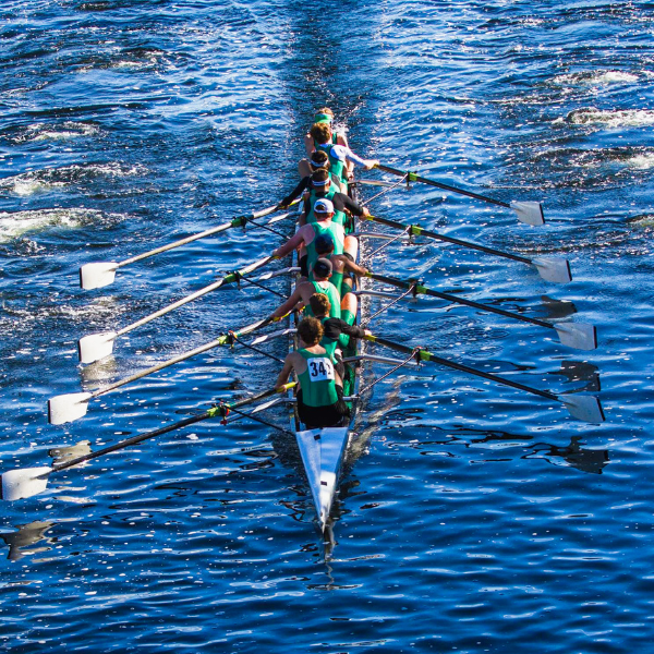 Trent Excalibur rowers, rowing boat in water.