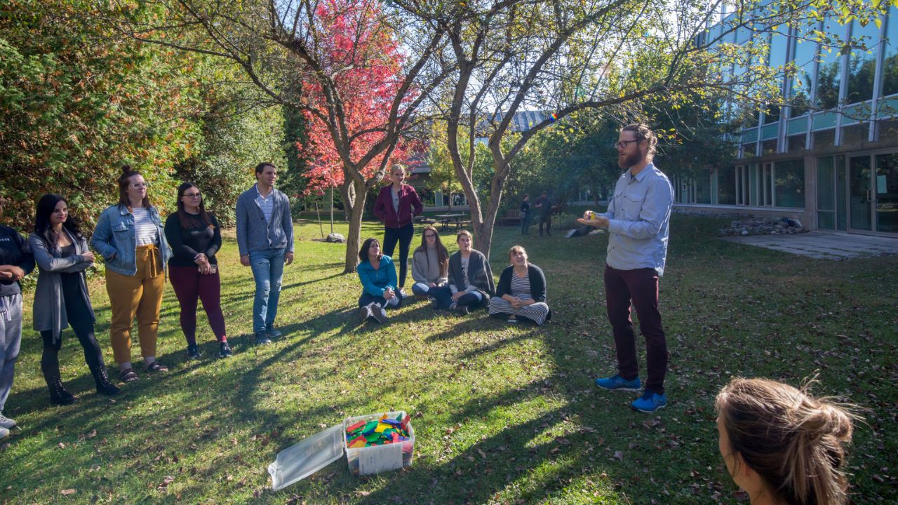 An instructor leading an outdoor lesson