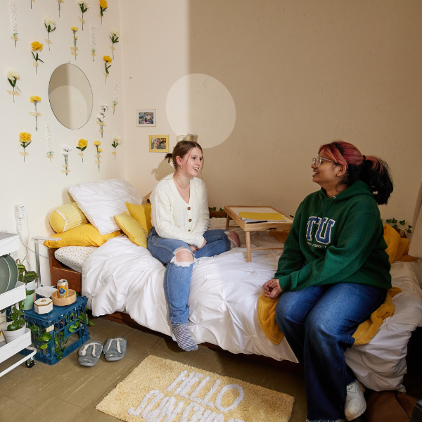 Students in Peterborough Residence room.