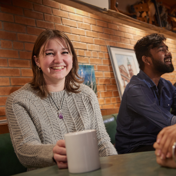 Student smiling at camera.