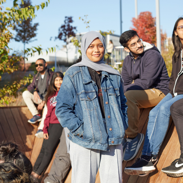 Student smiling at camera.