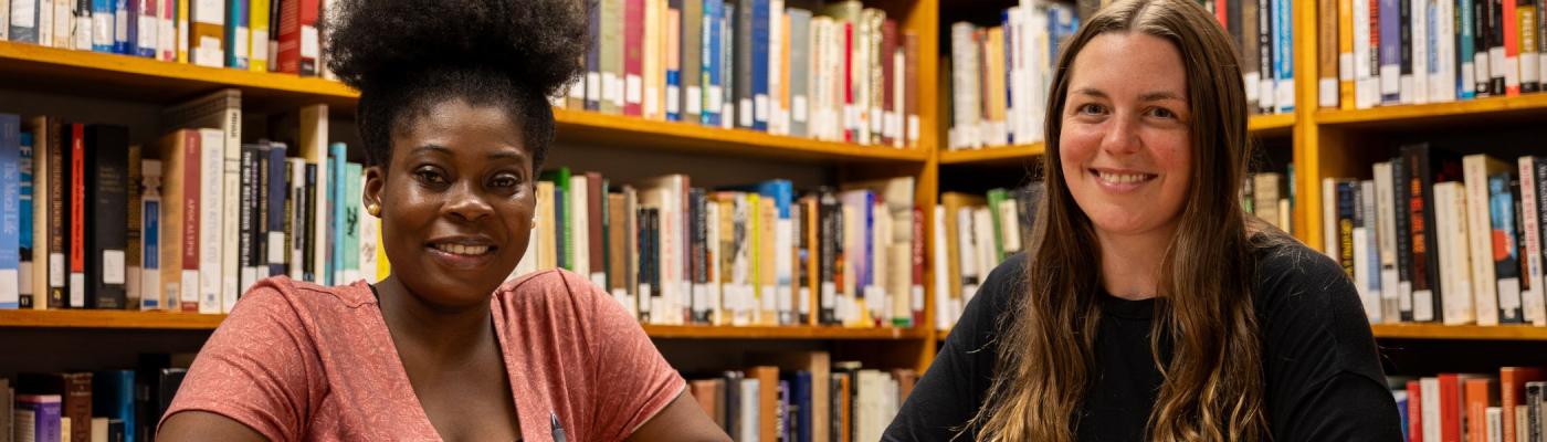 Two sudents studying together.