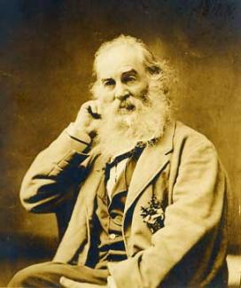 Sepia photograph of a man in a suit sitting down