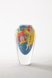 Glass vase with abstract design painted.