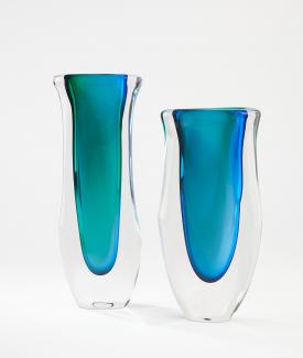 Two vases made of glass. Clear edge and blue interior.