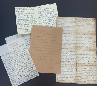 A photograph of old handwritten letters