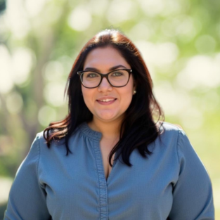Photo of Breanne Whitwell on a green background