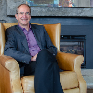 Holger Hintelmann sitting in an armchair smiling