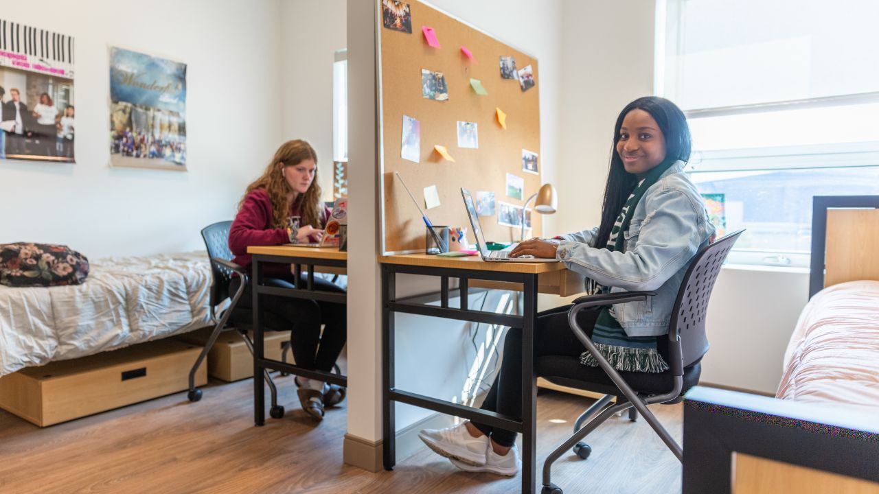 Students in a residence room.