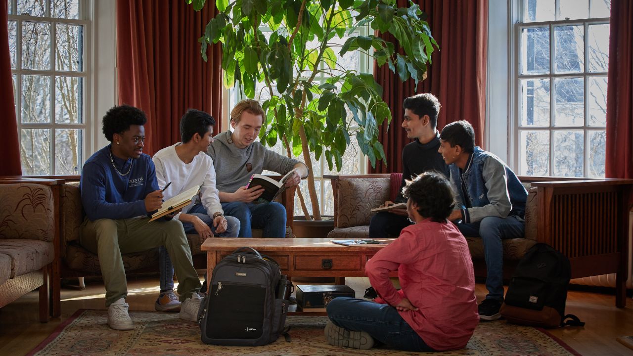 A group of students in conversation.